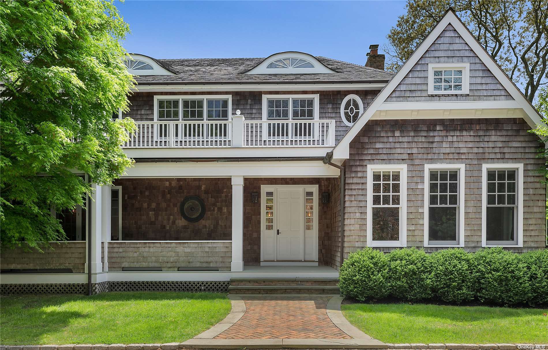 186 Skimhampton Road Amagansett, NY 11937 - Photo 1 of 1 a front view of a house with a yard