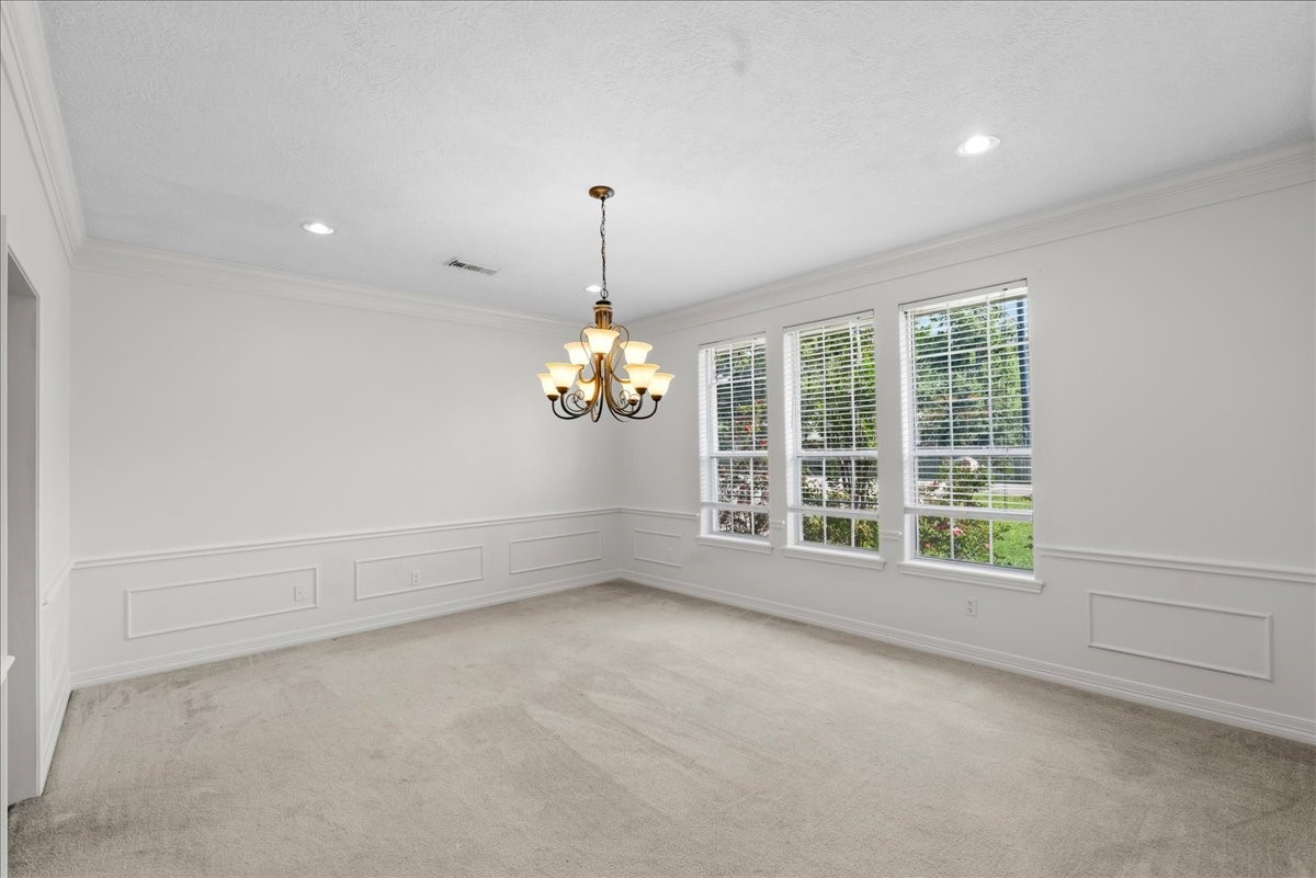 1607 Delta Lane Baytown, TX 77523 - Photo 6 of 48 Large dining room with natural light.