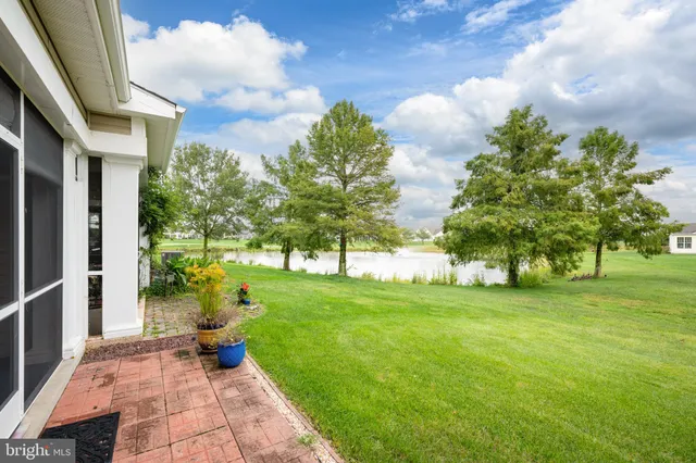 a view of a back yard of a house