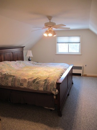 36 Edwardel Road Needham, MA 02492 - Photo 13 of 18 a bed sitting in a bedroom next to a window