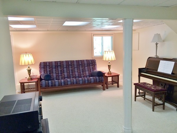36 Edwardel Road Needham, MA 02492 - Photo 17 of 18 a living room with furniture and a chair