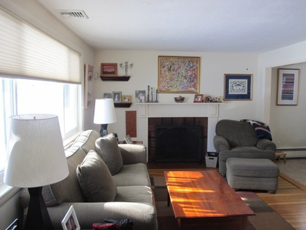 36 Edwardel Road Needham, MA 02492 - Photo 3 of 18 a living room with furniture and a fireplace