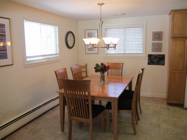 36 Edwardel Road Needham, MA 02492 - Photo 6 of 18 a view of a dining room with furniture window and wooden floor