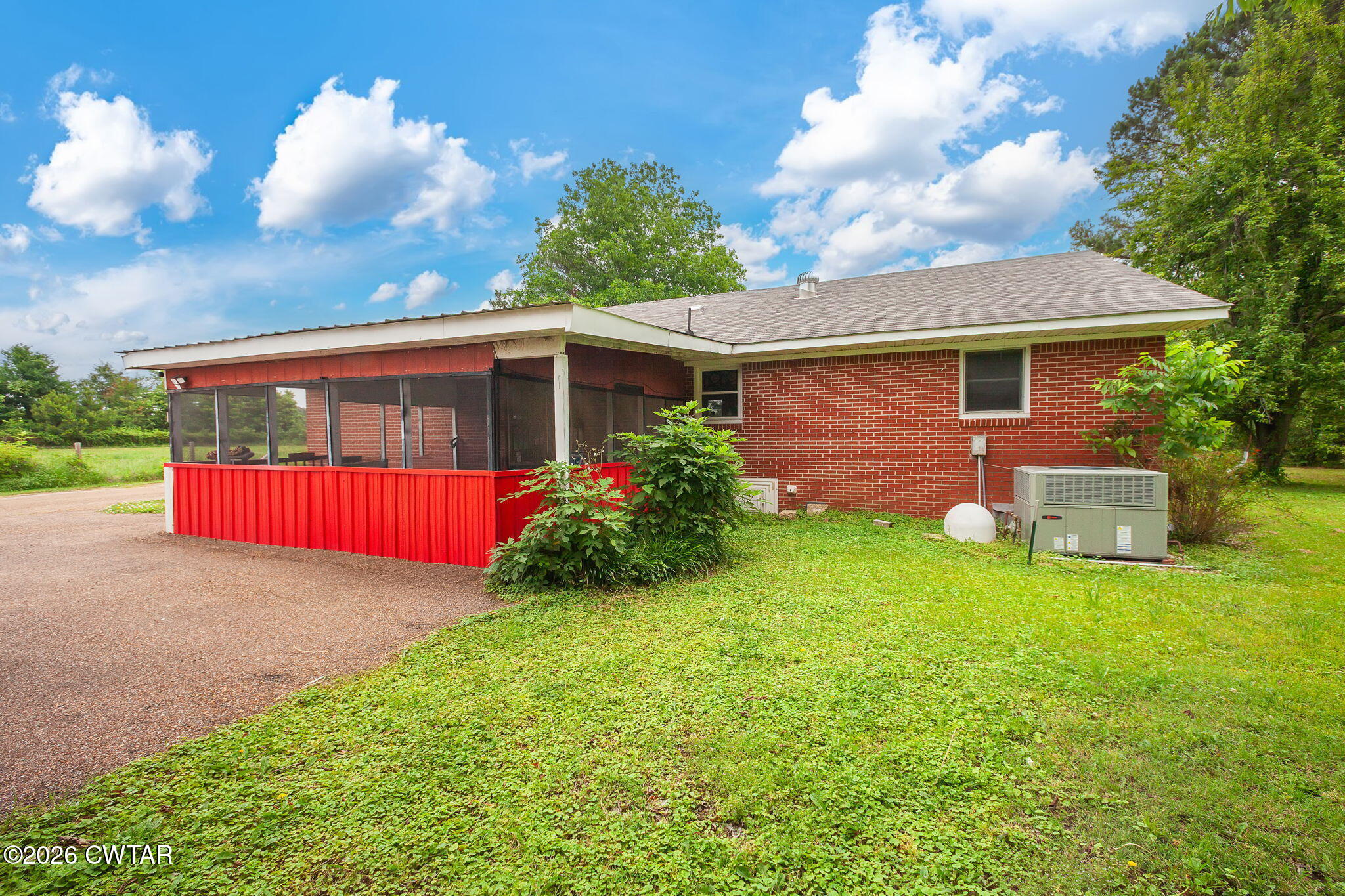 1921 Nance Road Alamo, TN 38001 - Photo 5 of 29 a view of backyard with seating space and trampoline