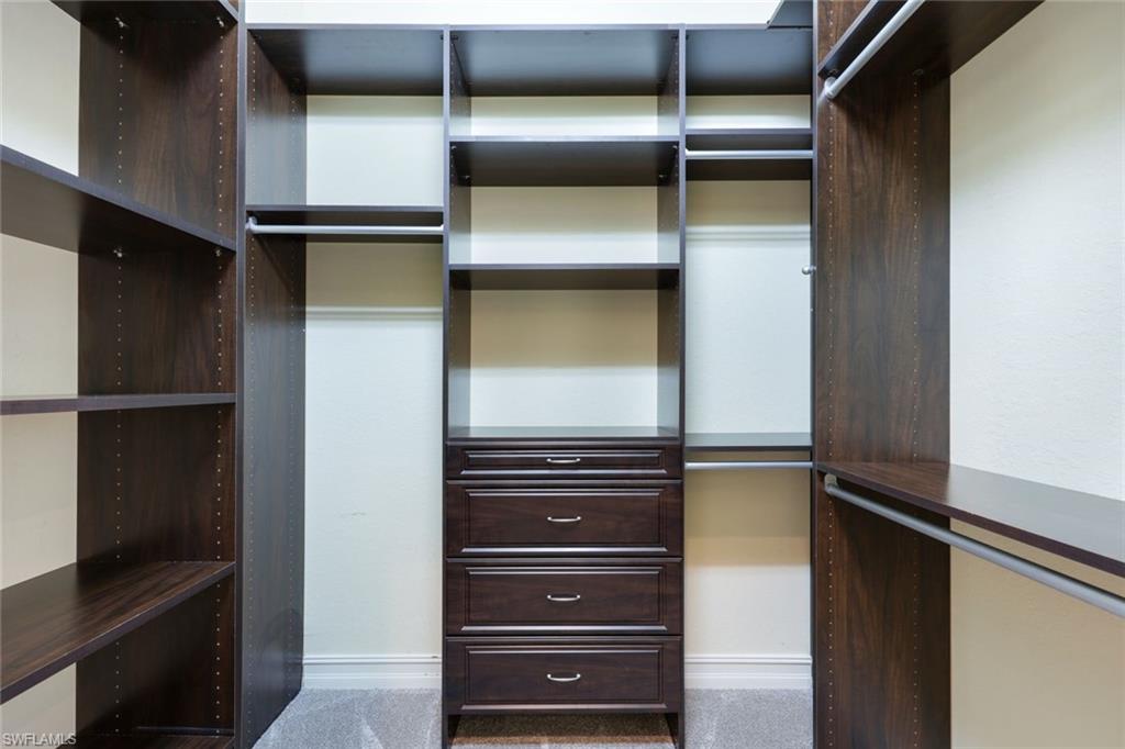 6592 Roma Way Naples, FL 34113 - Photo 19 of 41 Custom closets throughout