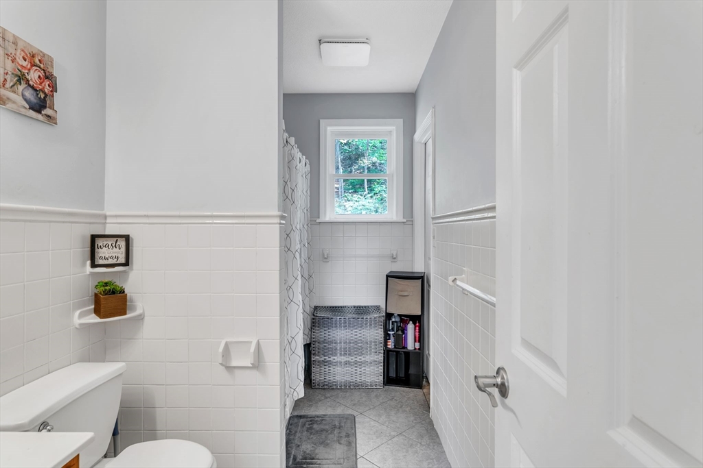 52 Warren Wright Road Belchertown, MA 01007 - Photo 16 of 41 a bathroom with a toilet and a shower