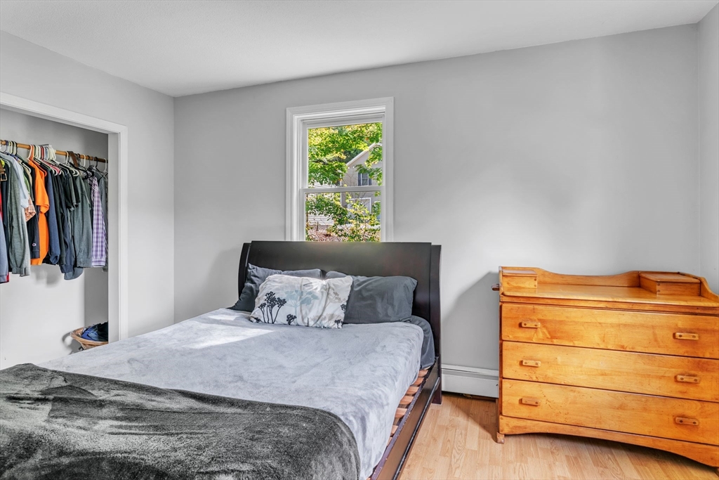 52 Warren Wright Road Belchertown, MA 01007 - Photo 25 of 41 a bedroom with a bed and a window