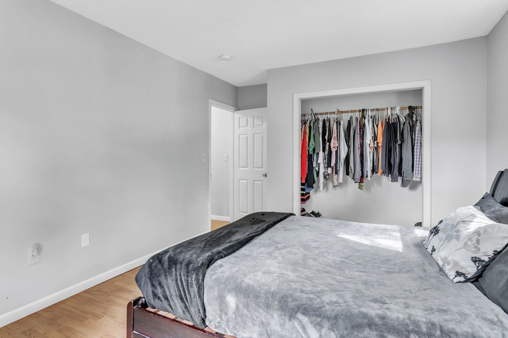 52 Warren Wright Road Belchertown, MA 01007 - Photo 26 of 41 a bed room with a bed and a window