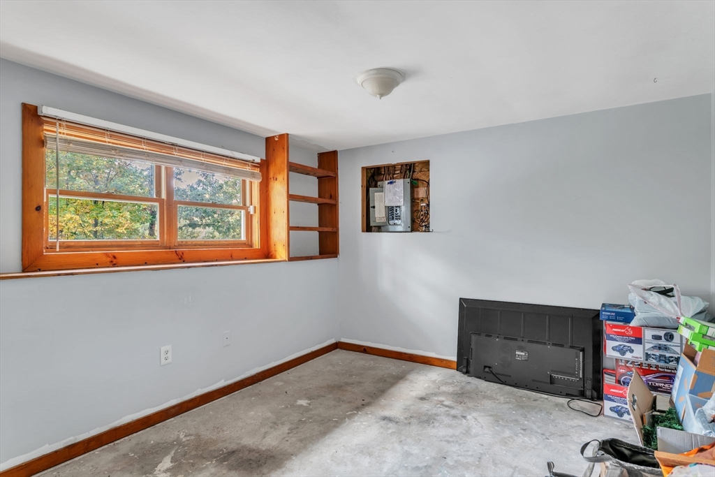52 Warren Wright Road Belchertown, MA 01007 - Photo 27 of 41 a view of a livingroom with toys