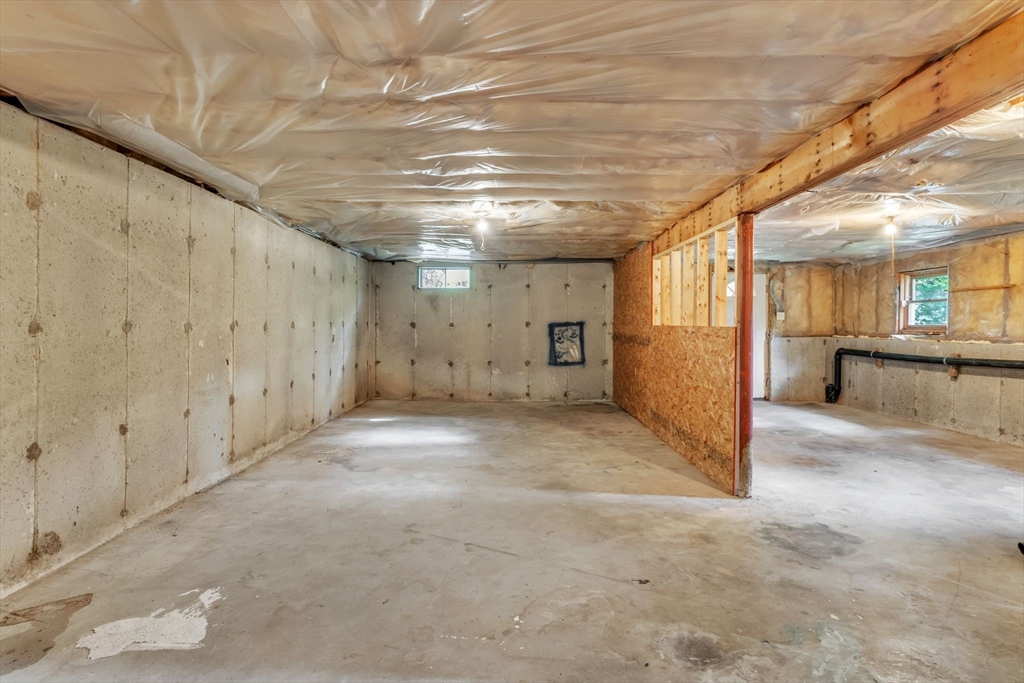 52 Warren Wright Road Belchertown, MA 01007 - Photo 28 of 41 a view of a hallway with wooden walls