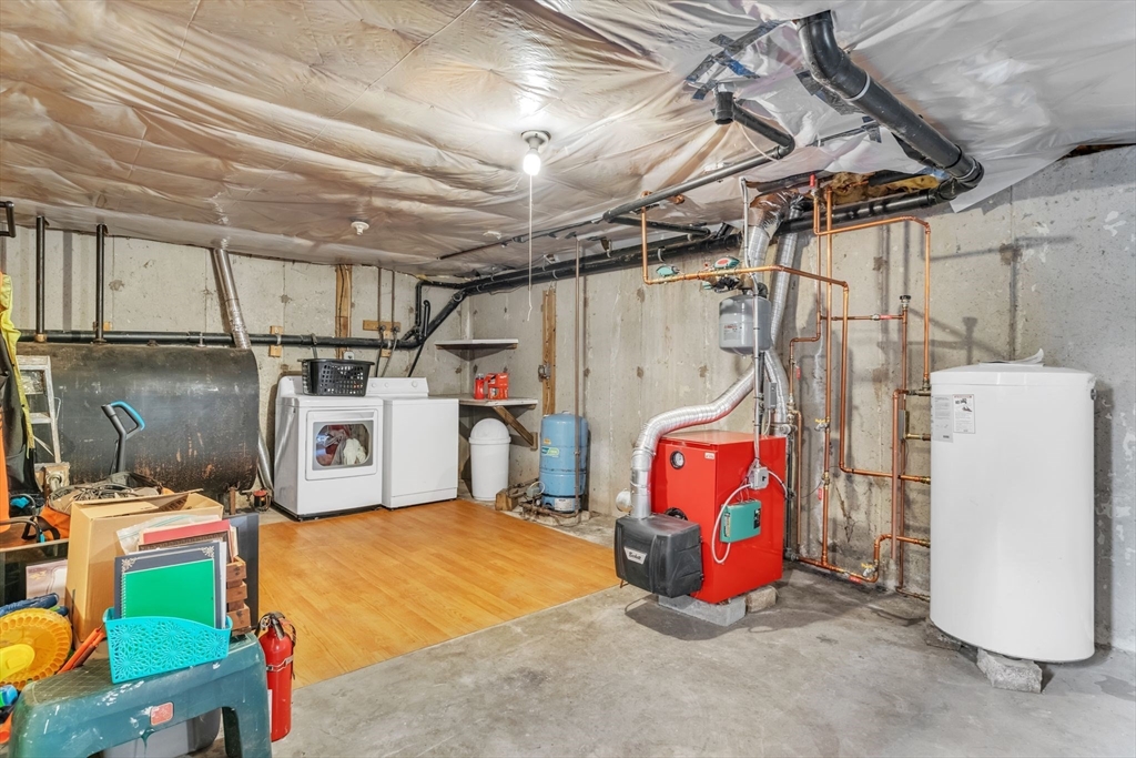 52 Warren Wright Road Belchertown, MA 01007 - Photo 32 of 41 a utility room with dryer and washer