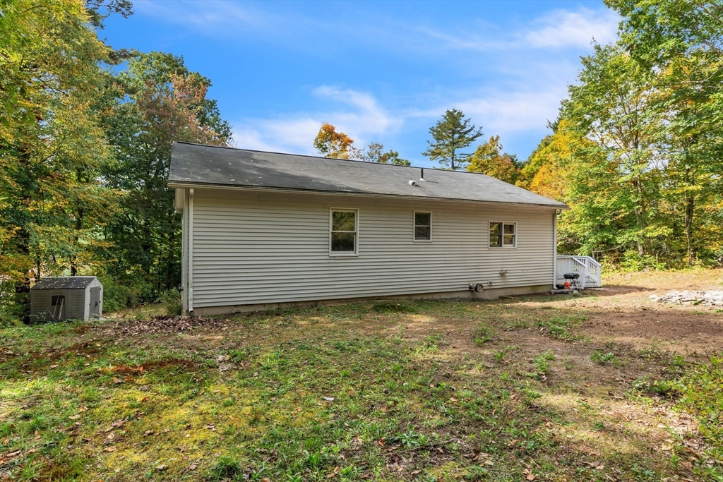 52 Warren Wright Road Belchertown, MA 01007 - Photo 34 of 41 a view of a house with a yard