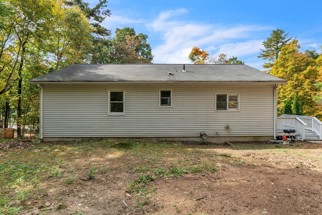 52 Warren Wright Road Belchertown, MA 01007 - Photo 35 of 41 a view of a house with a yard