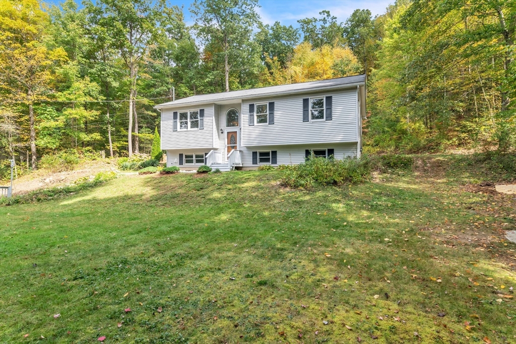 52 Warren Wright Road Belchertown, MA 01007 - Photo 38 of 41 a view of house with yard