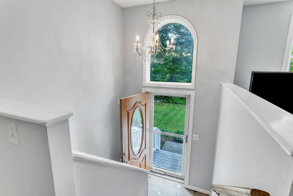 52 Warren Wright Road Belchertown, MA 01007 - Photo 7 of 41 a view of an entryway with wooden floor and door