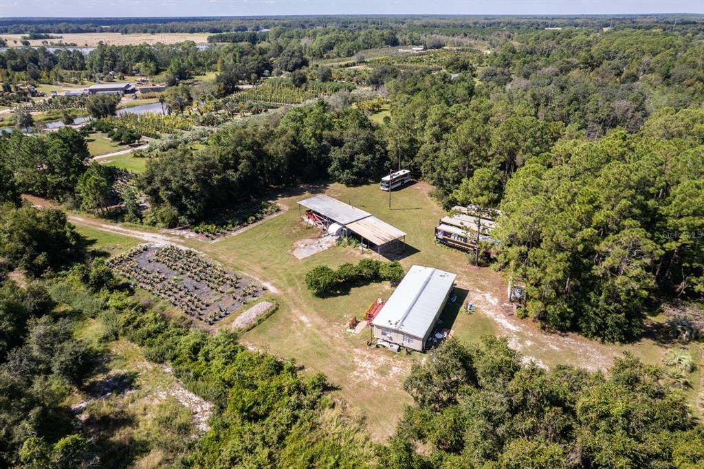 7432 McGill Road Groveland, FL 34736 - Photo 1 of 1 an aerial view of a house with a yard