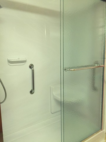 914 Westminster Road Joliet, IL 60435 - Photo 14 of 16 a bathroom with a shower