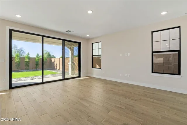a view of a kitchen with a sink and cabinet with a yard