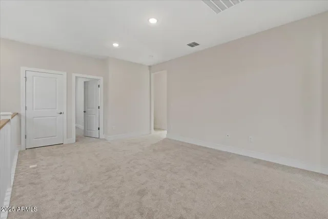 a bathroom with a toilet sink and shower