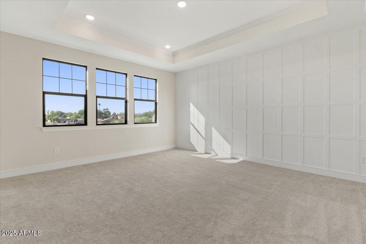 2431 West Los Arboles Place Chandler, AZ 85224 - Photo 32 of 60 an empty room with a window