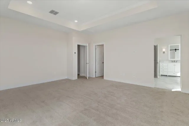 an empty room with staircase