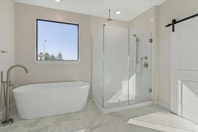 a bathroom with a sink and vanity