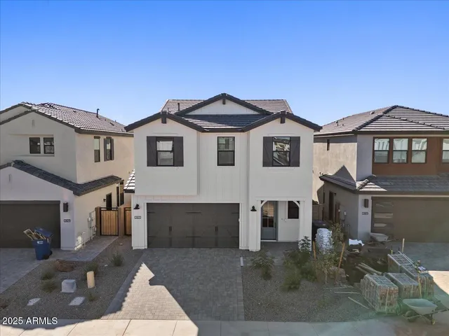 a front view of a house with parking