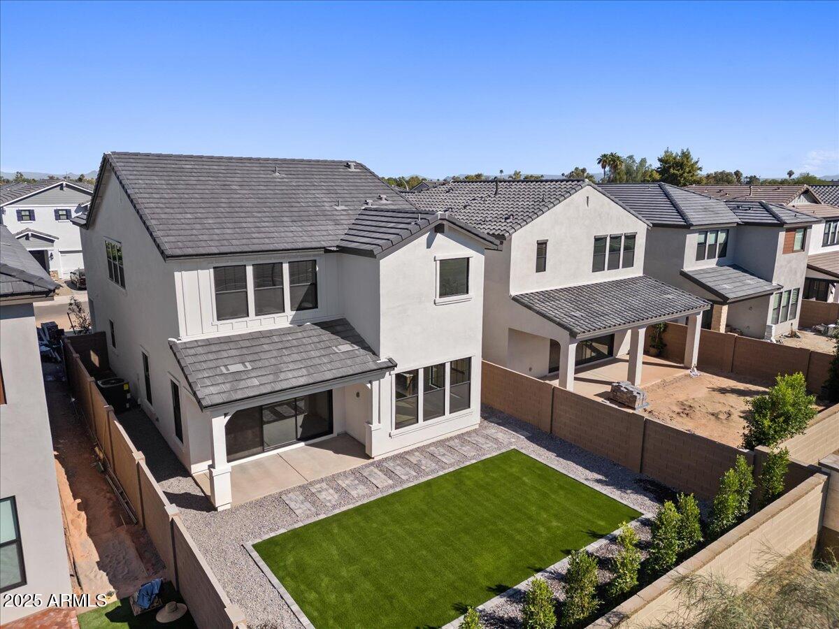 2431 West Los Arboles Place Chandler, AZ 85224 - Photo 56 of 60 a aerial view of a house with a yard