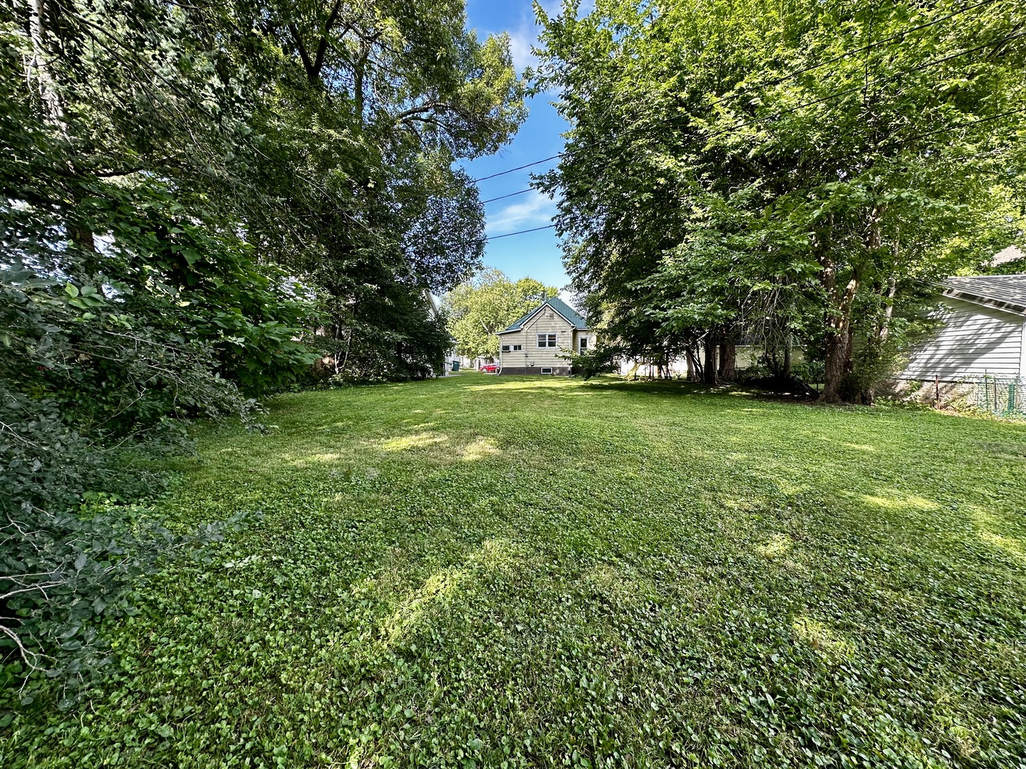 212 North Linden Street Clinton, IL 61727 - Photo 16 of 16 a view of a trees in front of a house