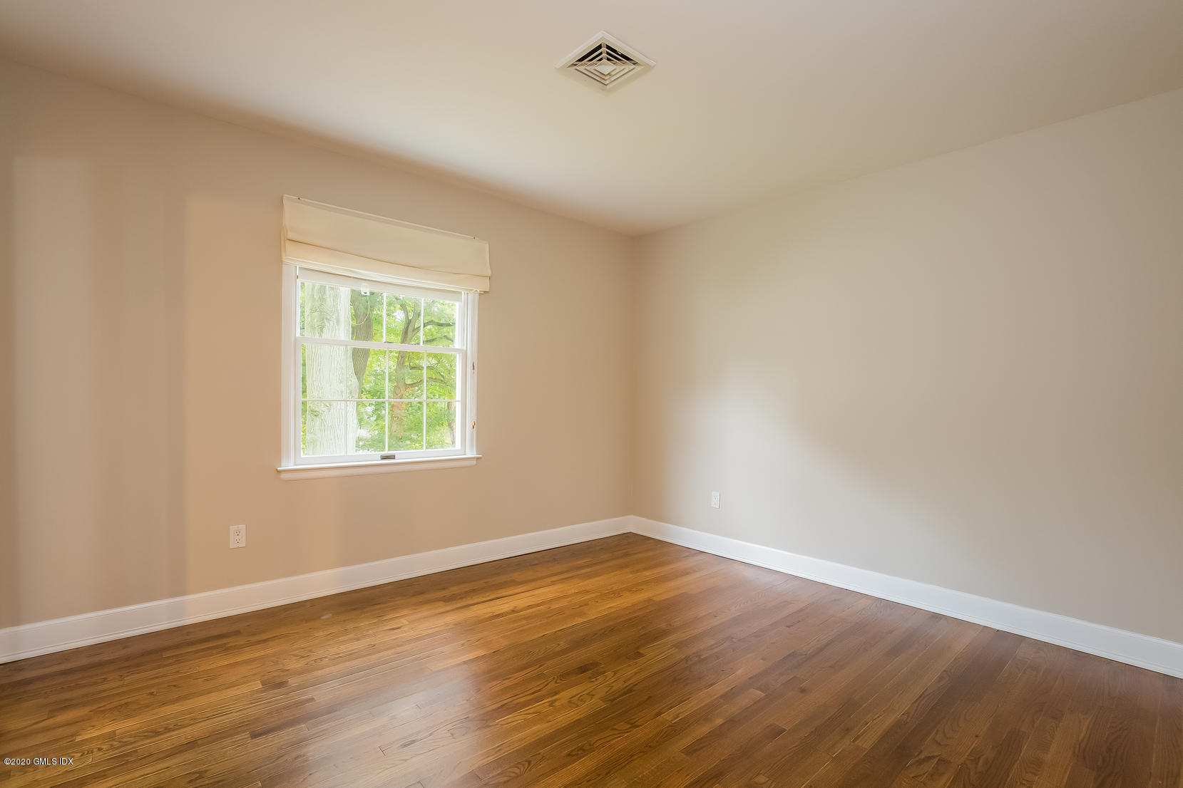 19 Peters Road Riverside, CT 06878 - Photo 11 of 17 wooden floor in an empty room with a window