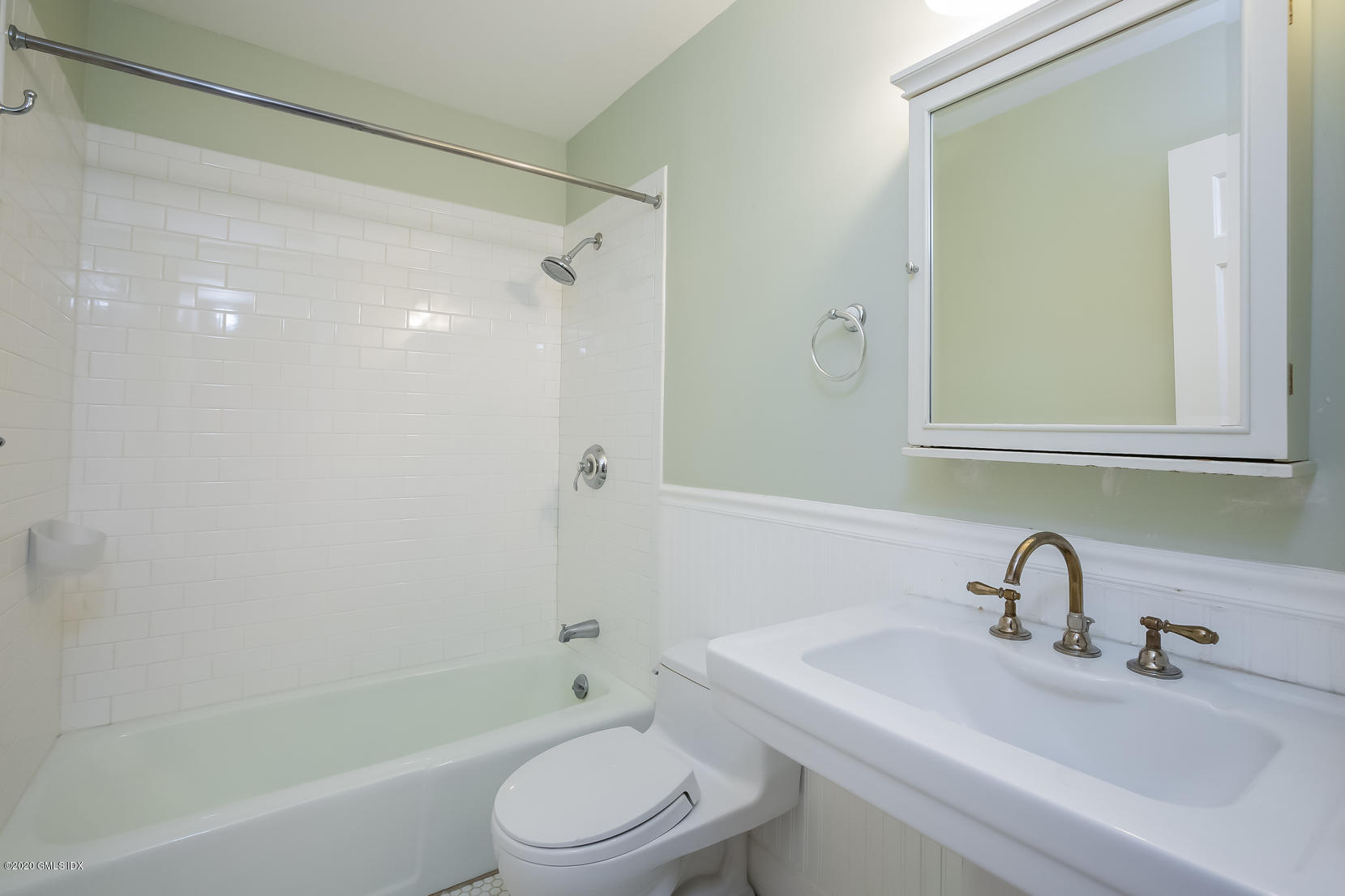 19 Peters Road Riverside, CT 06878 - Photo 12 of 17 a bathroom with a sink toilet and shower