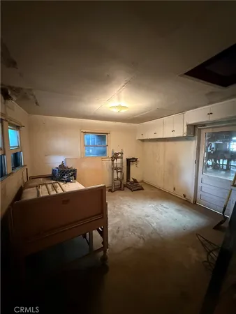 a view of room with gym equipment