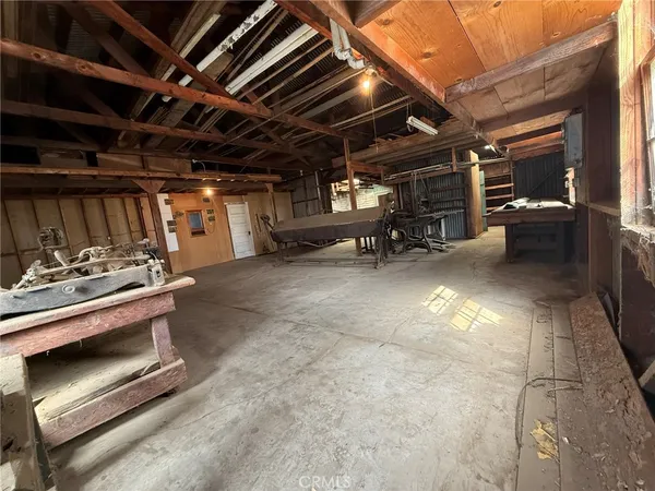 a bathroom with a toilet sink and shower