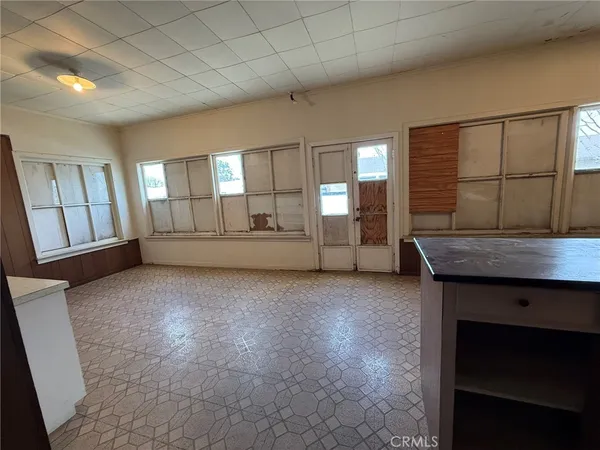 a house view with a backyard space