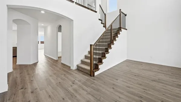 a view of entryway with wooden floor