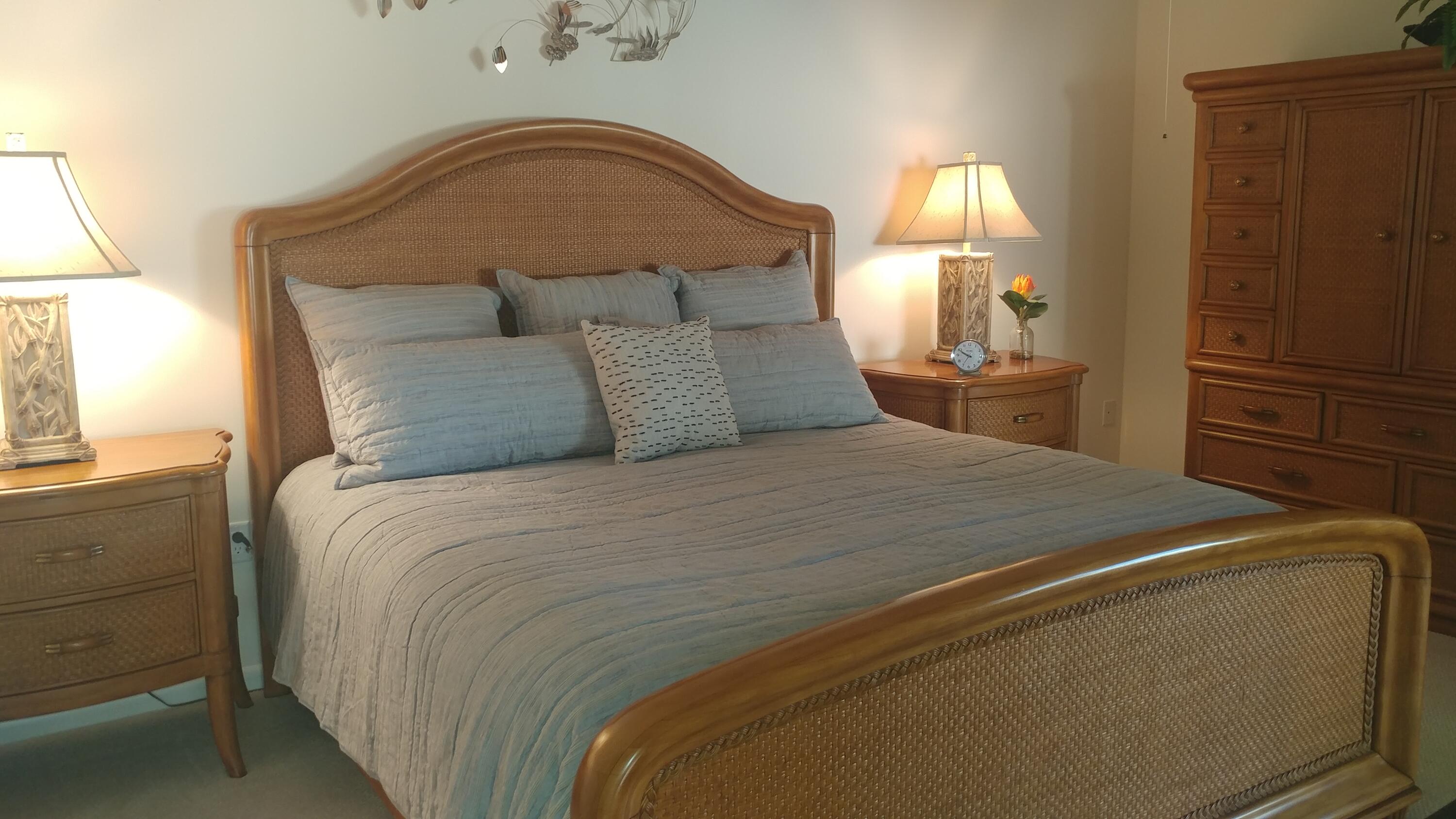 218 Ridge Road Jupiter, FL 33477 - Photo 5 of 7 a bedroom with a bed and a window