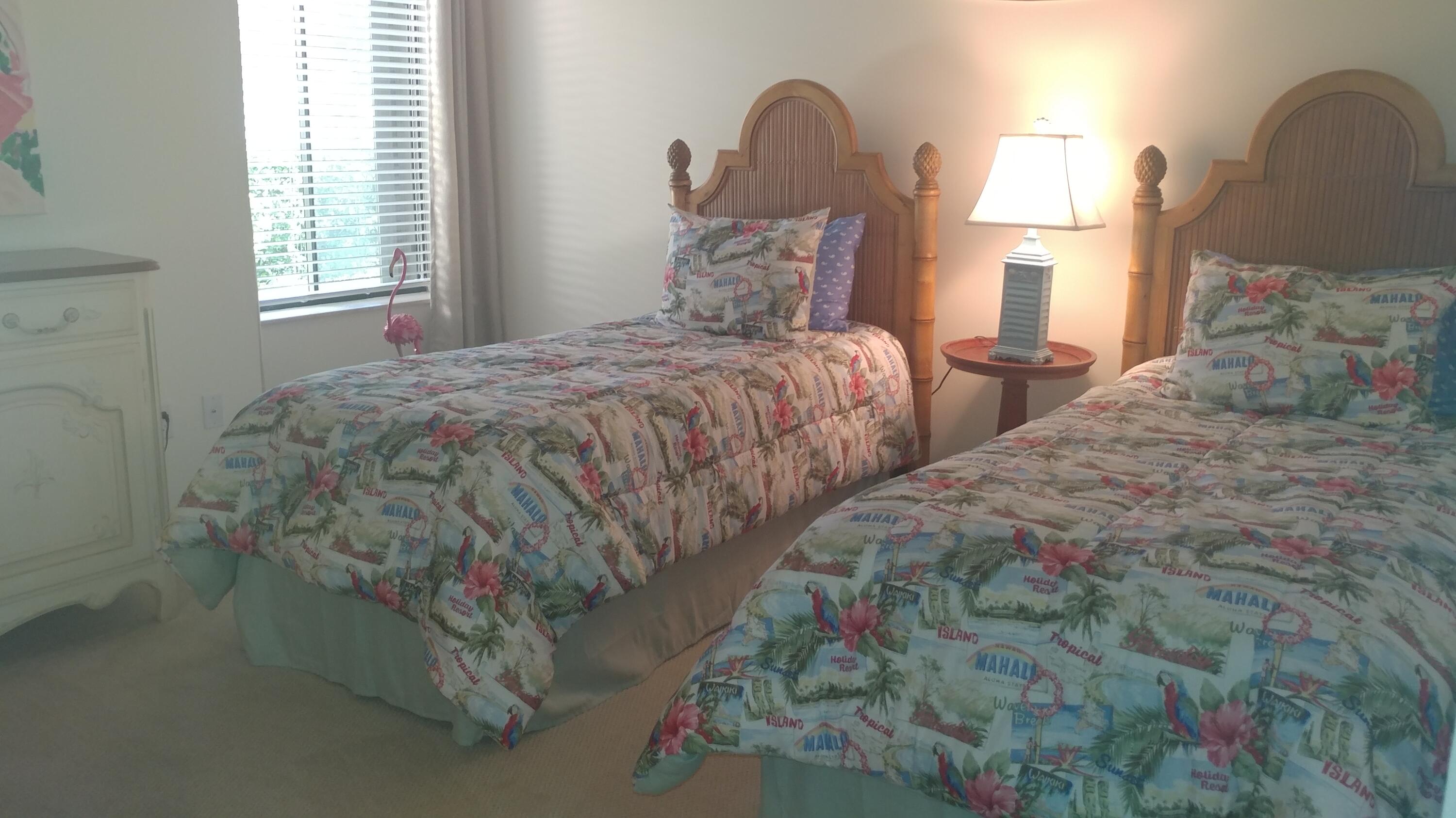 218 Ridge Road Jupiter, FL 33477 - Photo 7 of 7 a bed sitting in a bedroom next to a window