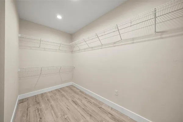 a view of a room with racks on the wall