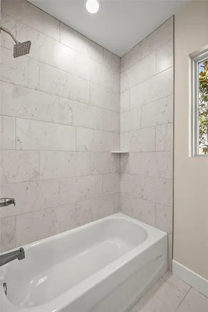 a bathroom with a bathtub