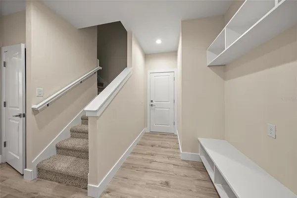a view of hallway with stairs