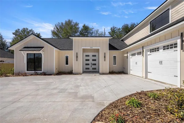 front view of a house with a yard