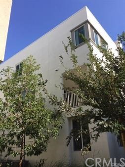 a view of balcony with wooden floor