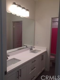 108 Terrapin Irvine, CA 92618 - Photo 11 of 14 a bathroom with a sink and a mirror