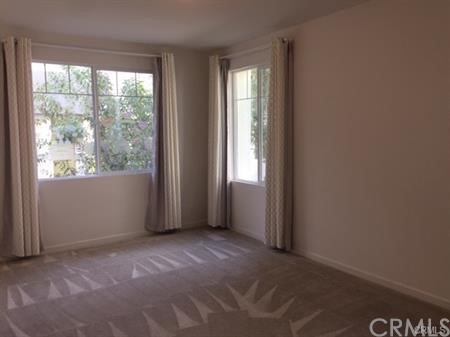 108 Terrapin Irvine, CA 92618 - Photo 3 of 14 an empty room with windows