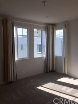 108 Terrapin Irvine, CA 92618 - Photo 9 of 14 an empty room with windows