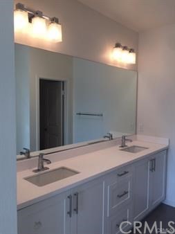 108 Terrapin Irvine, CA 92618 - Photo 10 of 14 a bathroom with a sink and a mirror