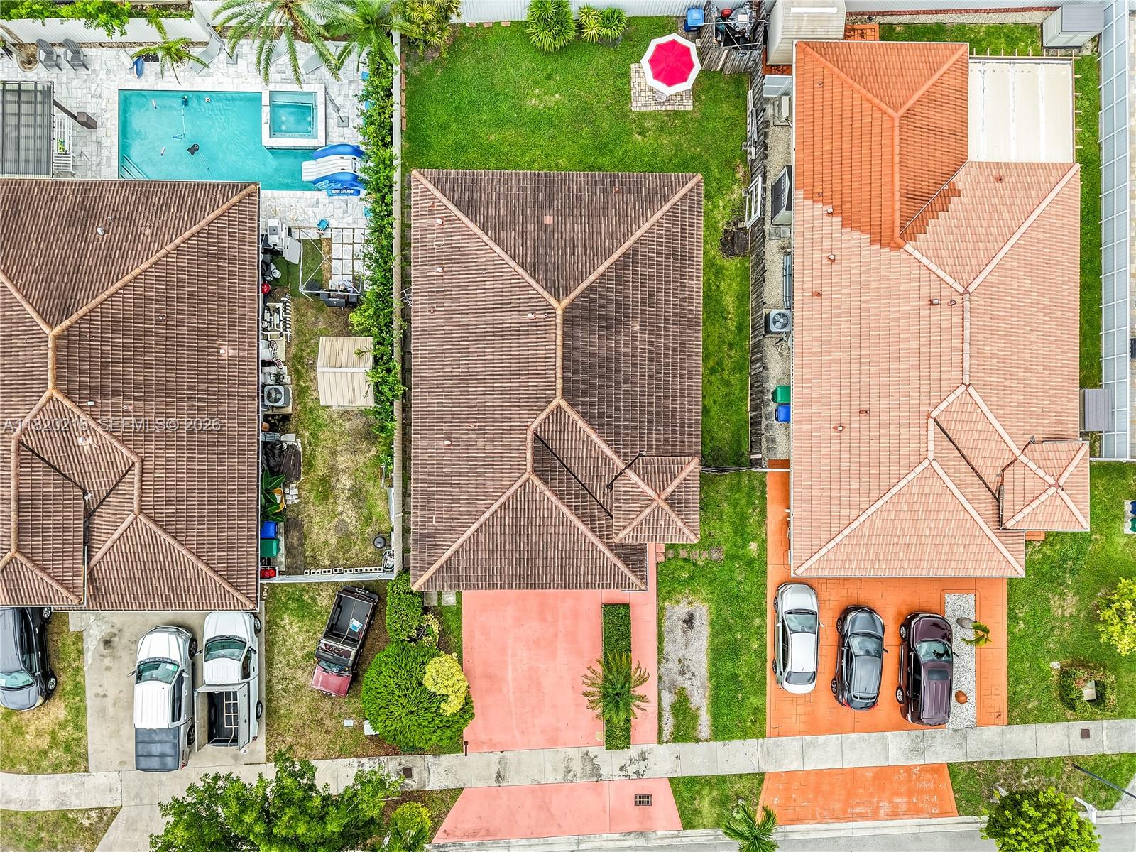 19730 Northwest 78th Avenue Hialeah, FL 33015 - Photo 26 of 30 an aerial view of multiple houses