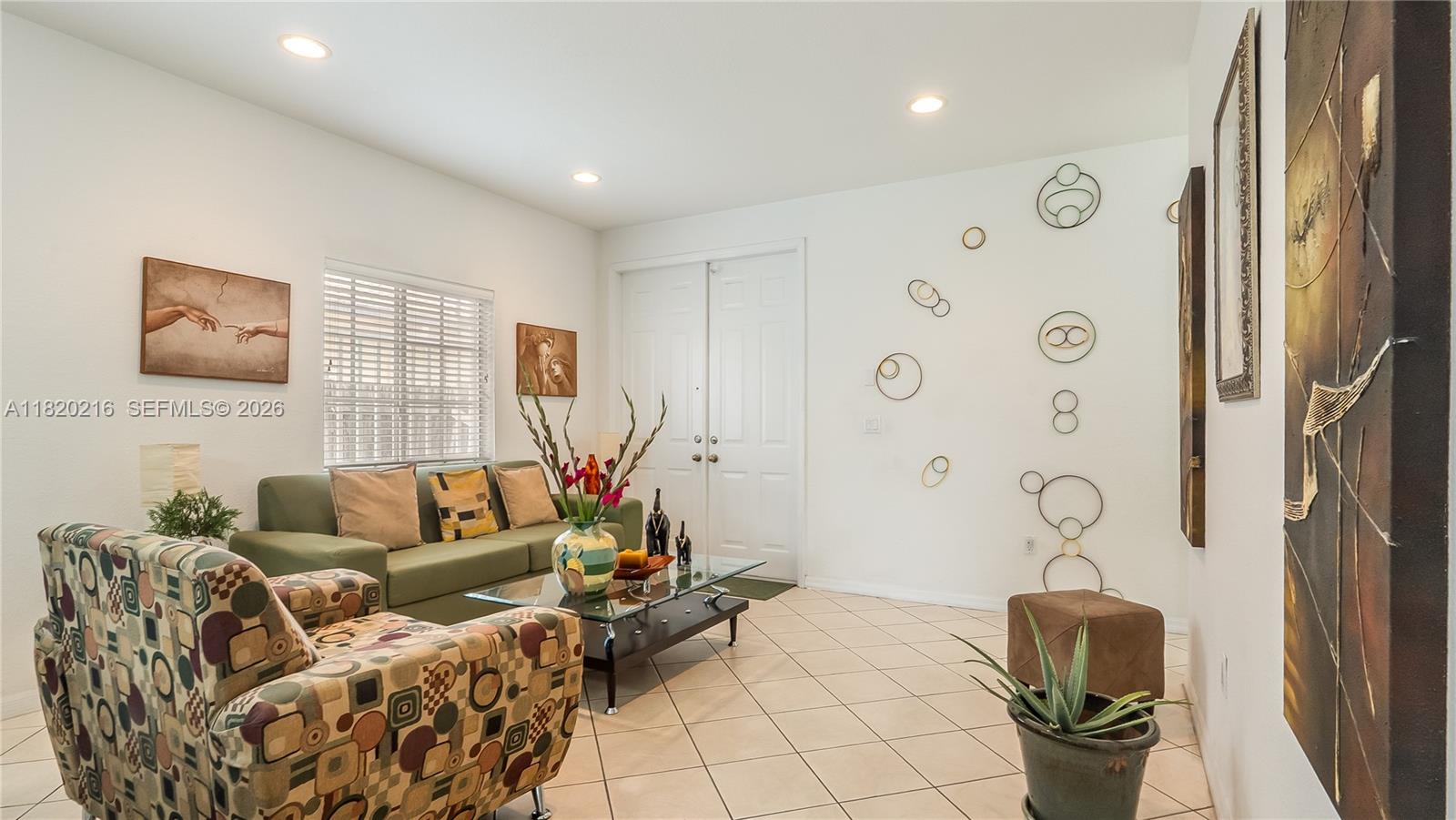 19730 Northwest 78th Avenue Hialeah, FL 33015 - Photo 4 of 30 a living room with furniture