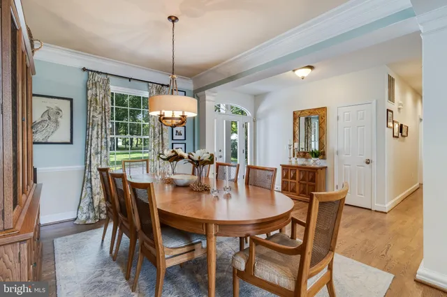 a bedroom with a large bed and a dresser