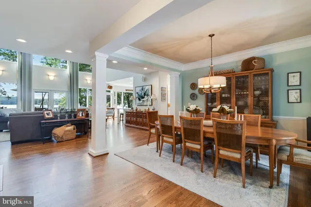 a en suite bathroom with a granite countertop sink and a mirror